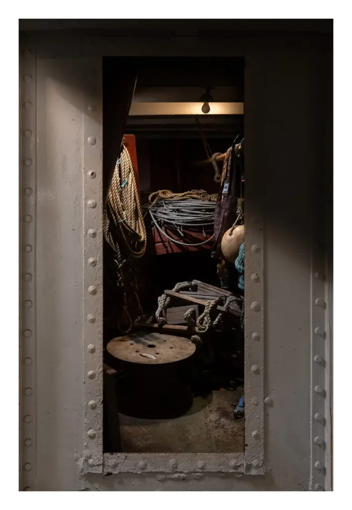 An atmospheric photo of the Bosun’s store through the hatch
